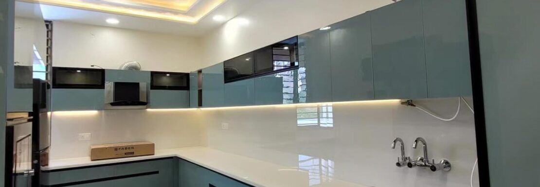 A family enjoying a meal in a modern, spacious 3 BHK flat living room in Omicron 1, Greater Noida.